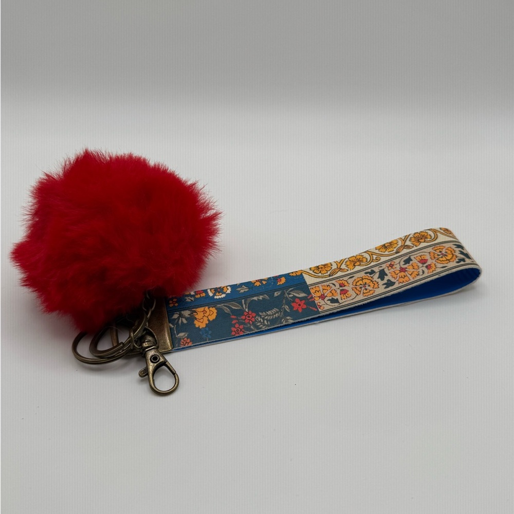 Patterned Keychain Wristlet with Red Pom Pom